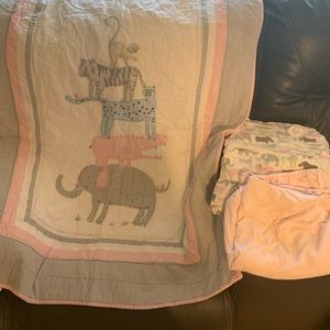 Pottery barn crib sized quilt and two sheets